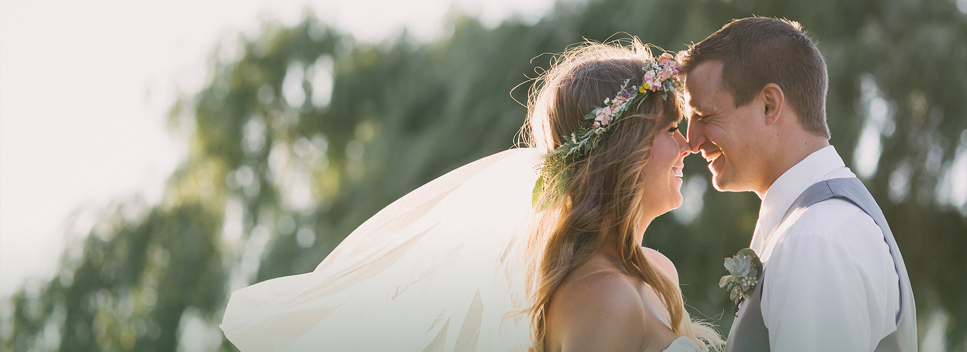 image of bride and groom embracing after wedding ceremony